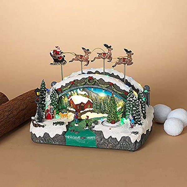 Gerson Company 2530780 Holiday Village 13.5 In Battery Operated Decoration with Flying Sleigh and Moving Tree